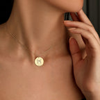 Custom Round Pendant featuring icons such as zodiac signs, initials, and musical instruments.